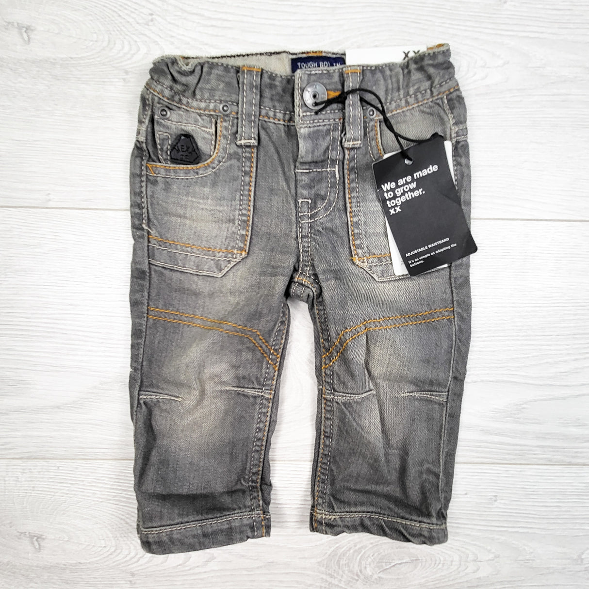NEW - Mexx grey distressed jeans. Size 6-9 months