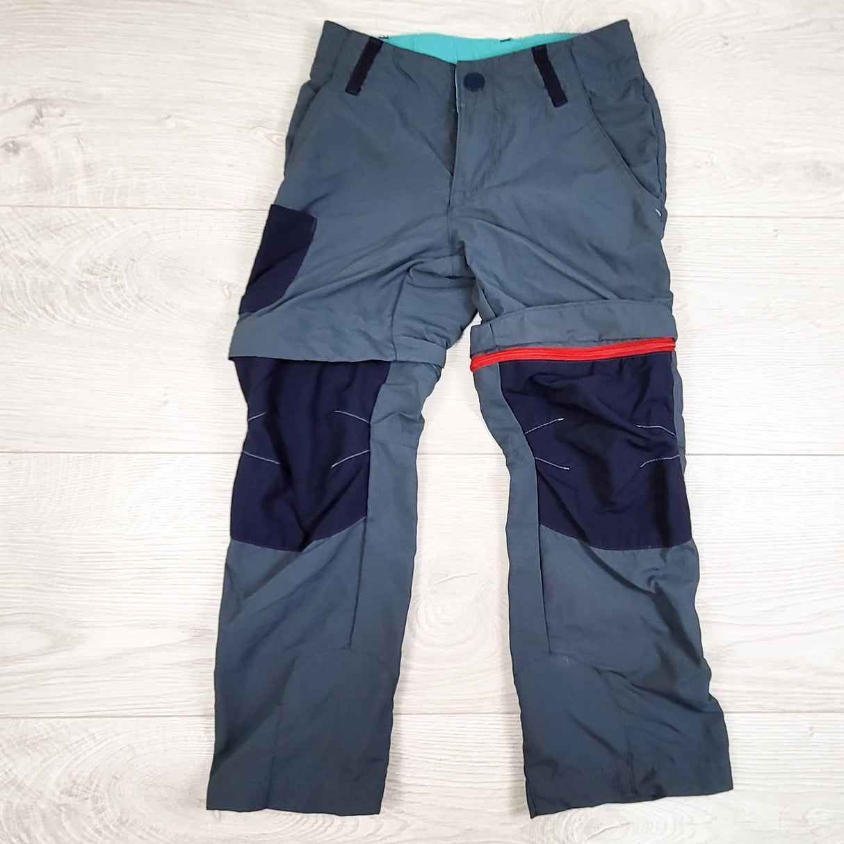 Decathlon lightweight performance Quechua hiking pants with zip away legs. Size 4/5T