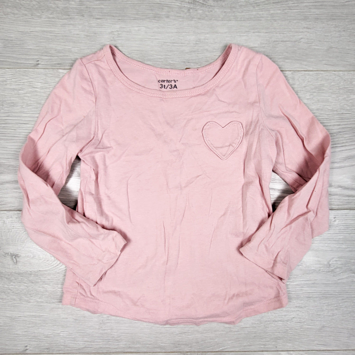 Carters bubblegum pink top with heart pocket. Size 3T