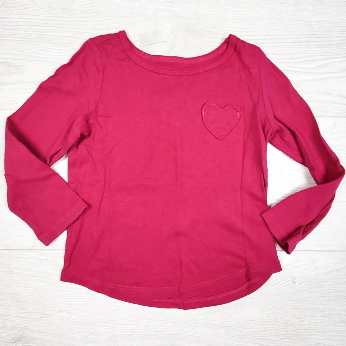 Carters dark pink top with heart pocket. Size 3T