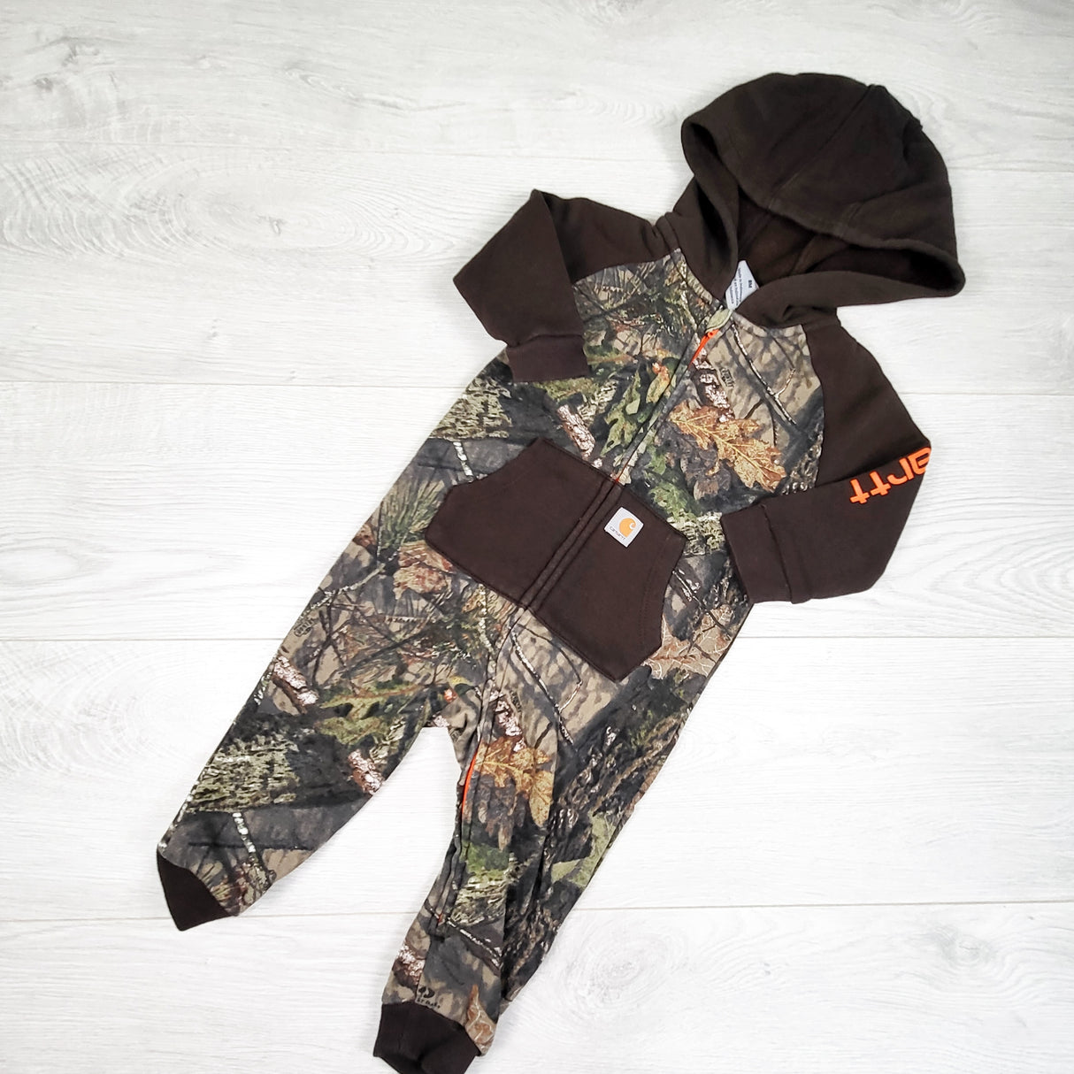 Carhartt brown and camouflage fleecy lined hooded sweatshrirt coveralls. Size 9 months