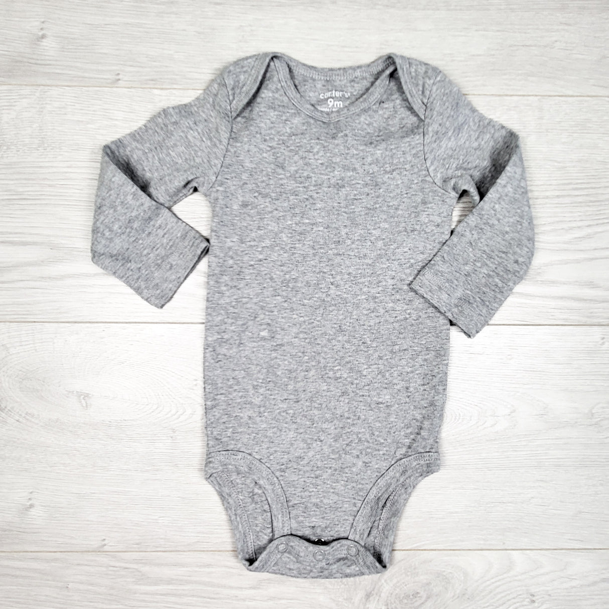 Carters solid grey bodysuit. Size 9 months