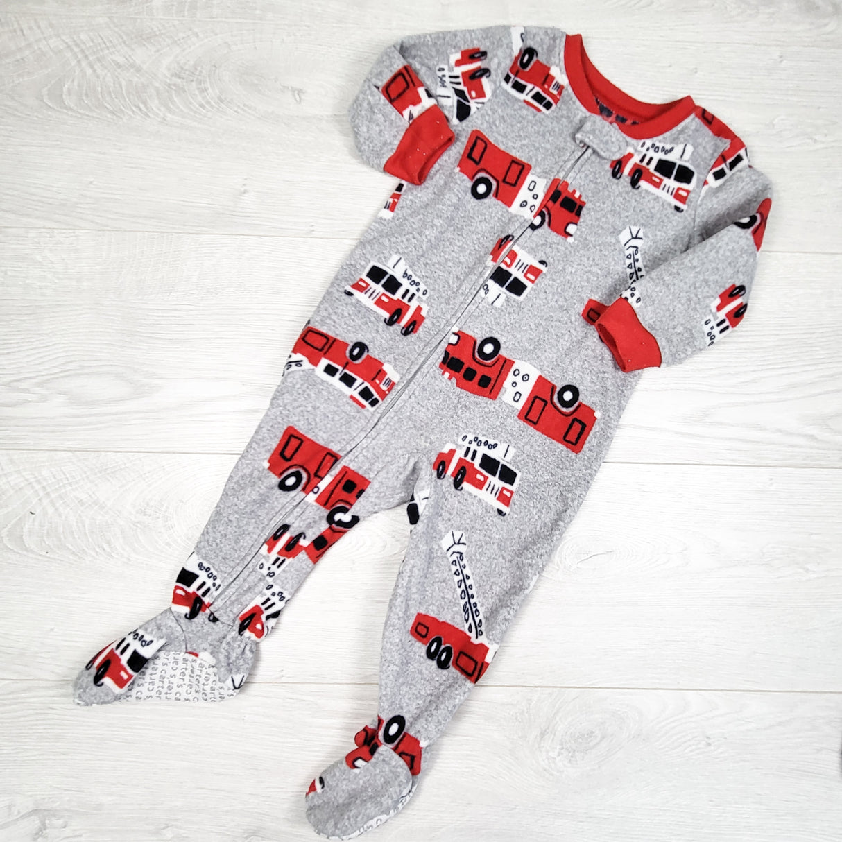 Carters grey zippered fleece sleeper with fire trucks. Size 12 months