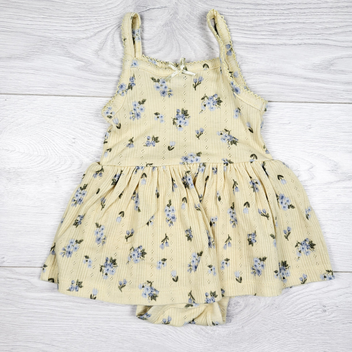 Old Navy yellow floral print bodysuit dress. Size 3-6 months