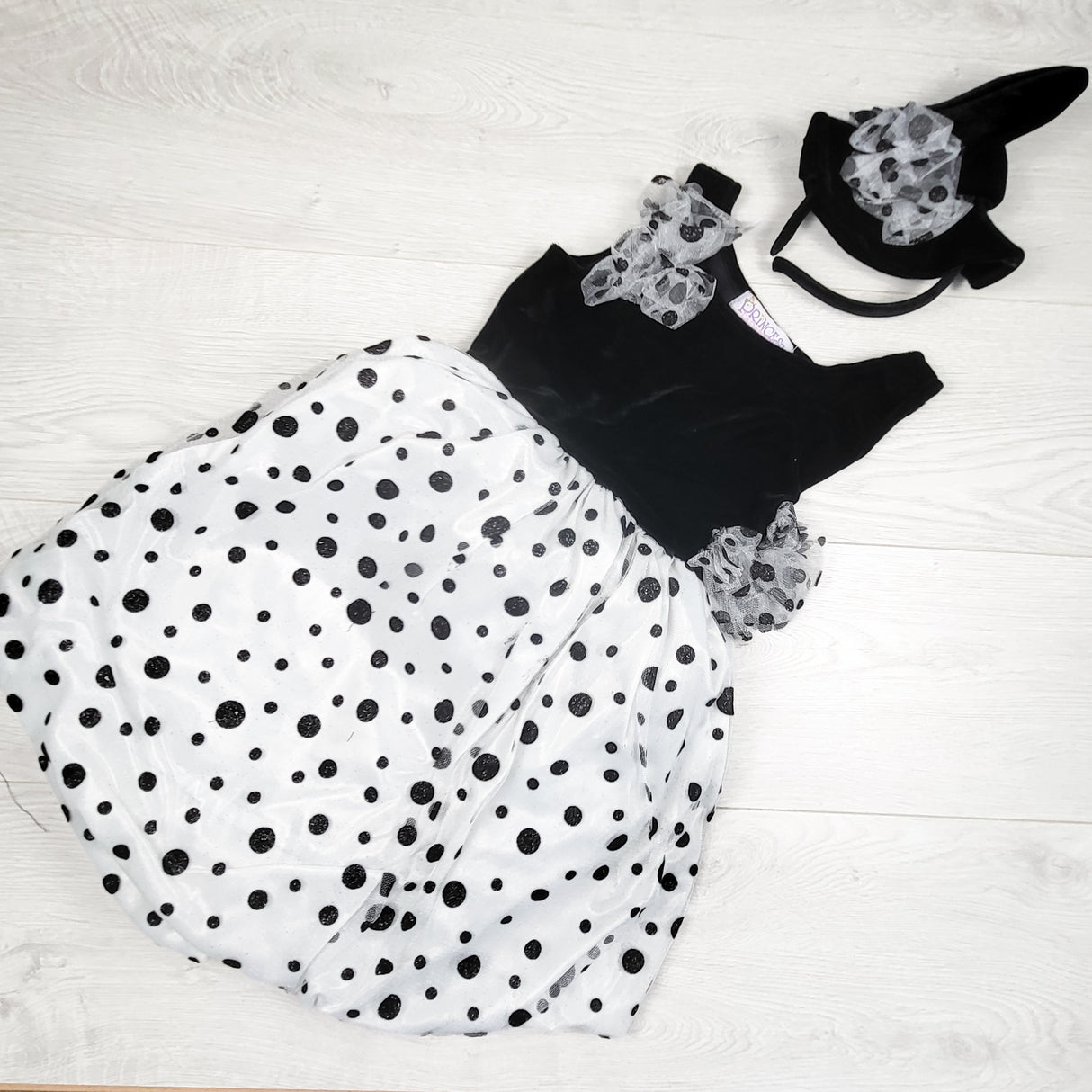 Princess Paradise black and white polka dot dress with mini hat headband. Size 8
