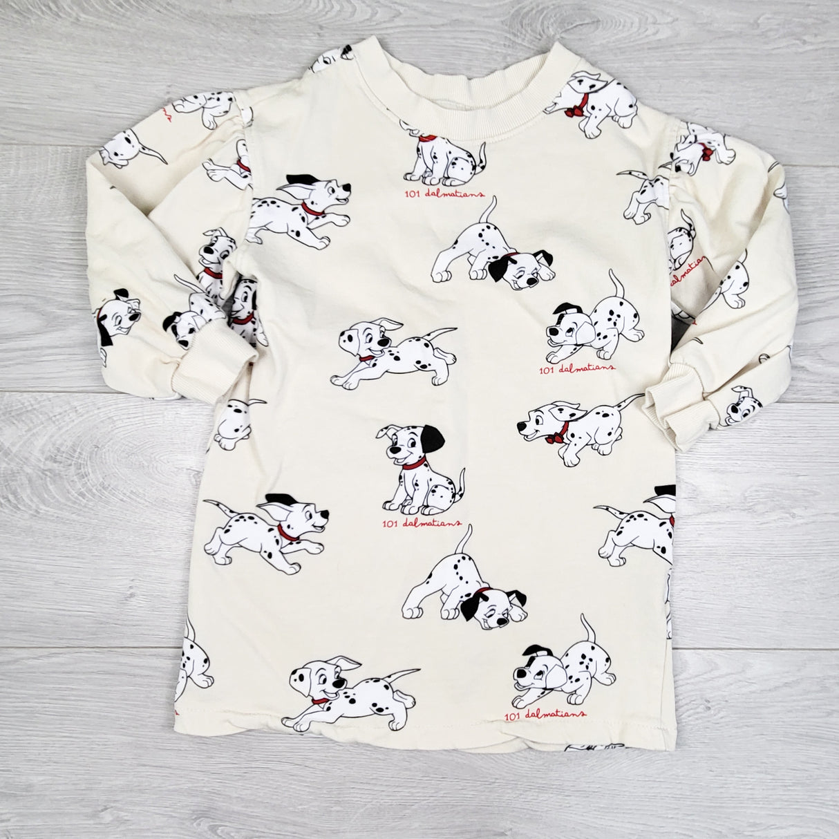 H and M cream 101 Dalmatians sweatshirt dress. Size 4-6 Years