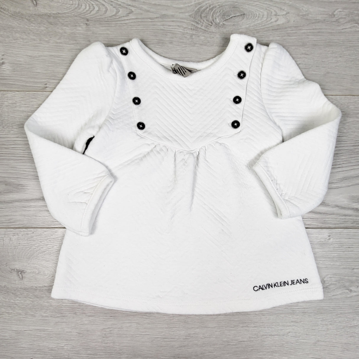 Calvin Klein white quilted dress. Size 18 months