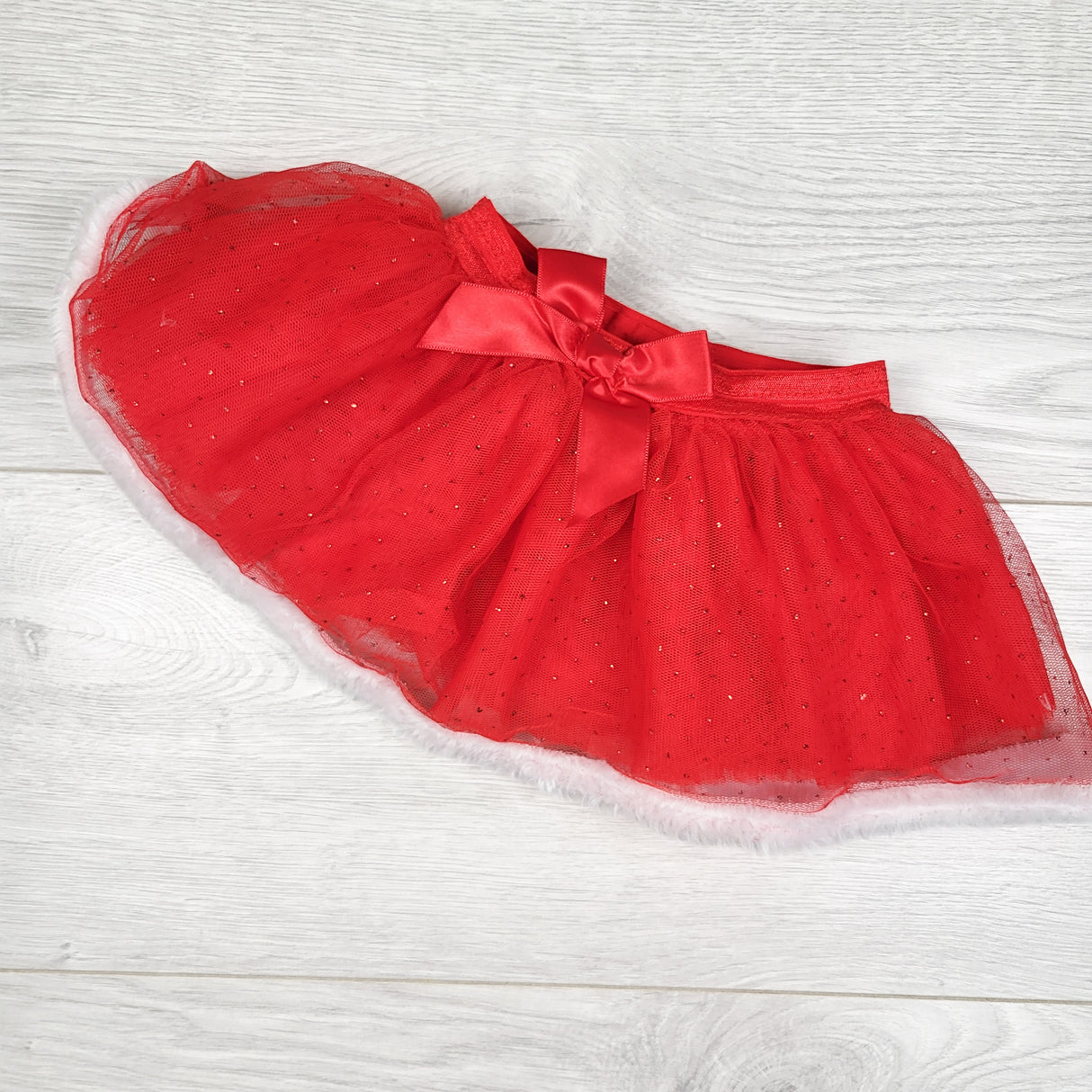 So 'Dorable red sparkle tutu skirt. Size 0-12 months