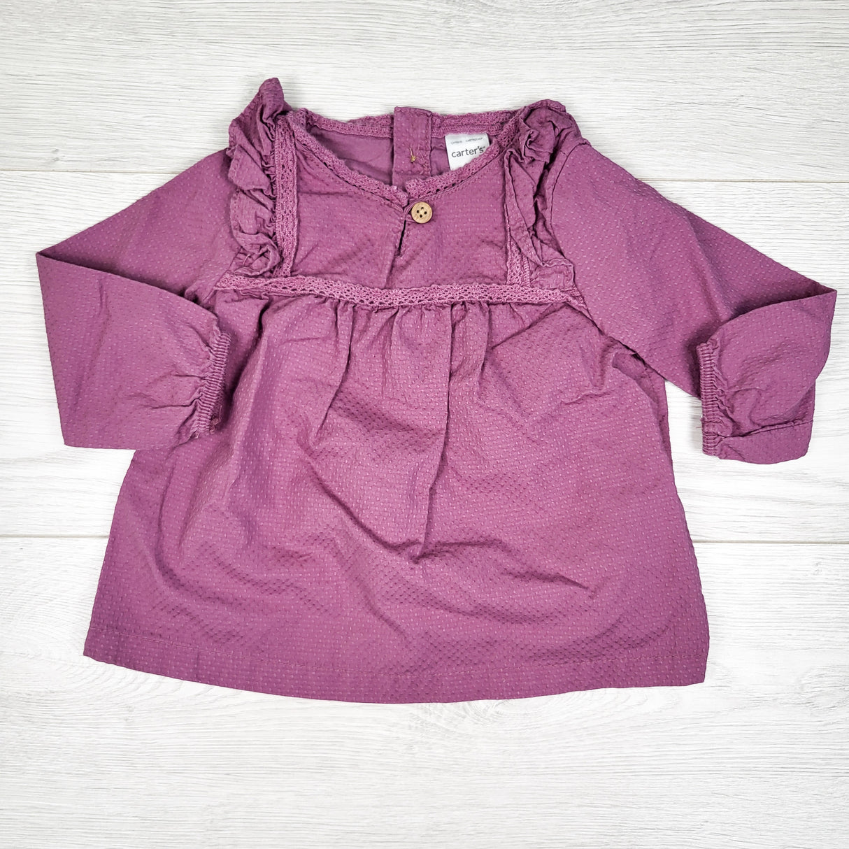 Carters purple ruffle blouse. Size 6 months