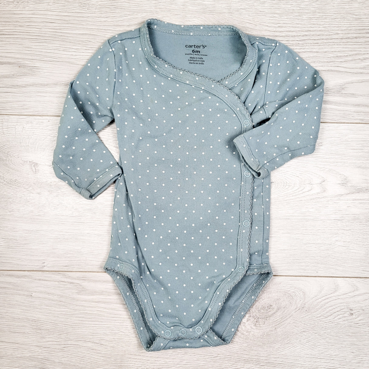 Carters blue polka dot wrap style bodysuit. Size 6 months
