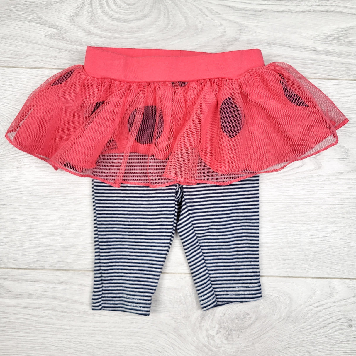 Carters striped leggings with polka dot tulle skirting. Newborn size