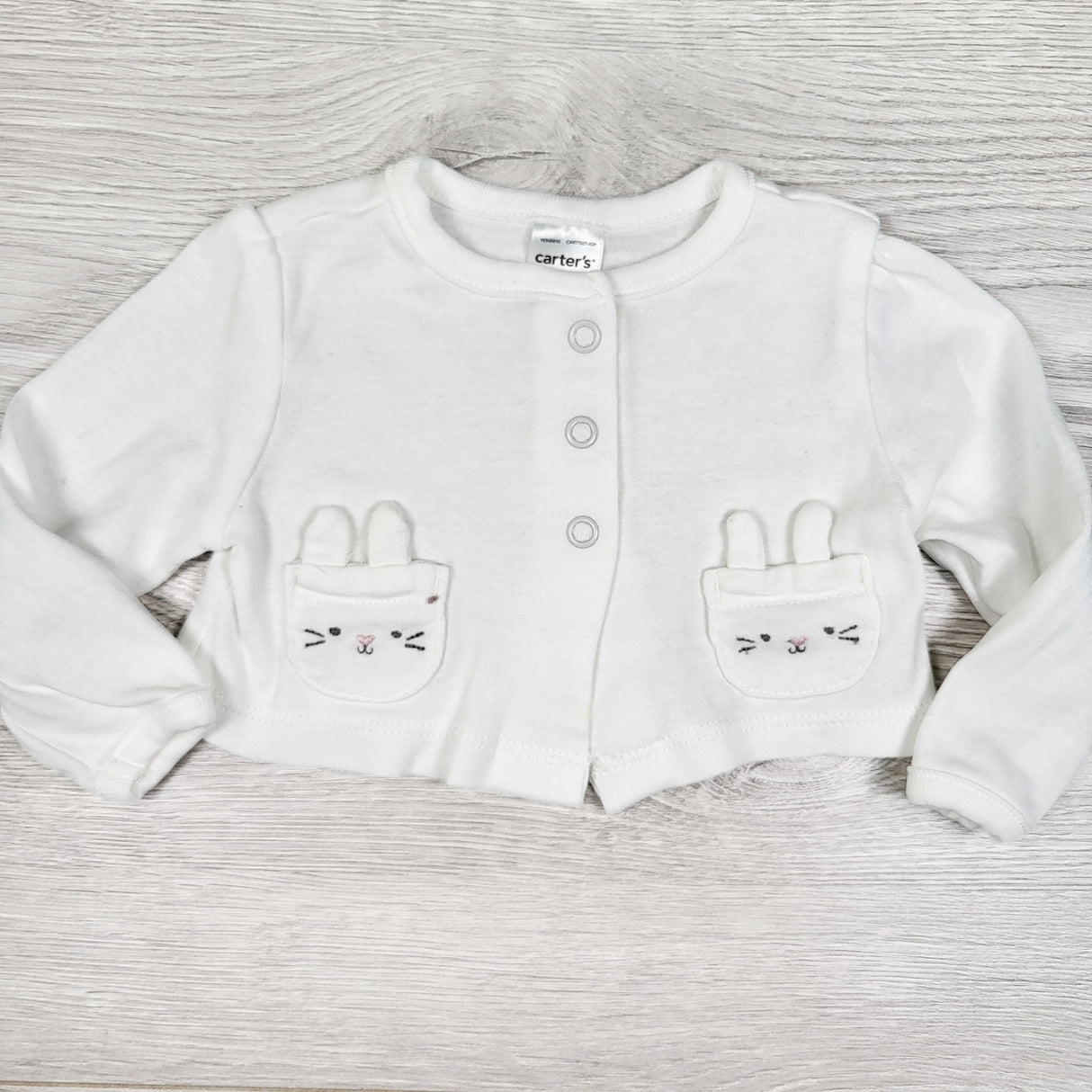 Carters white snap button top with bunnies. Size 3 months