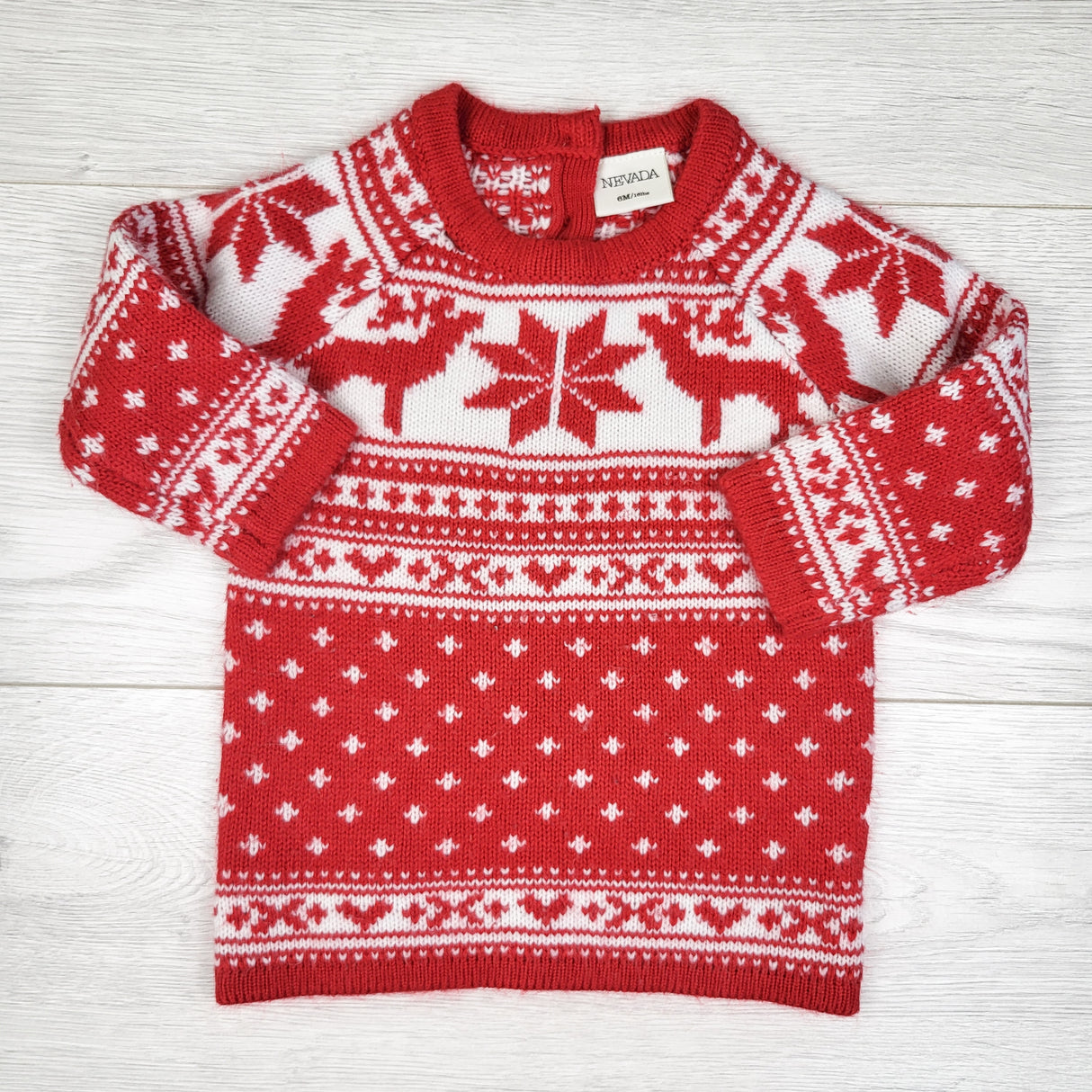 Nevada red Christmas patterned sweater dress. Size 6 months