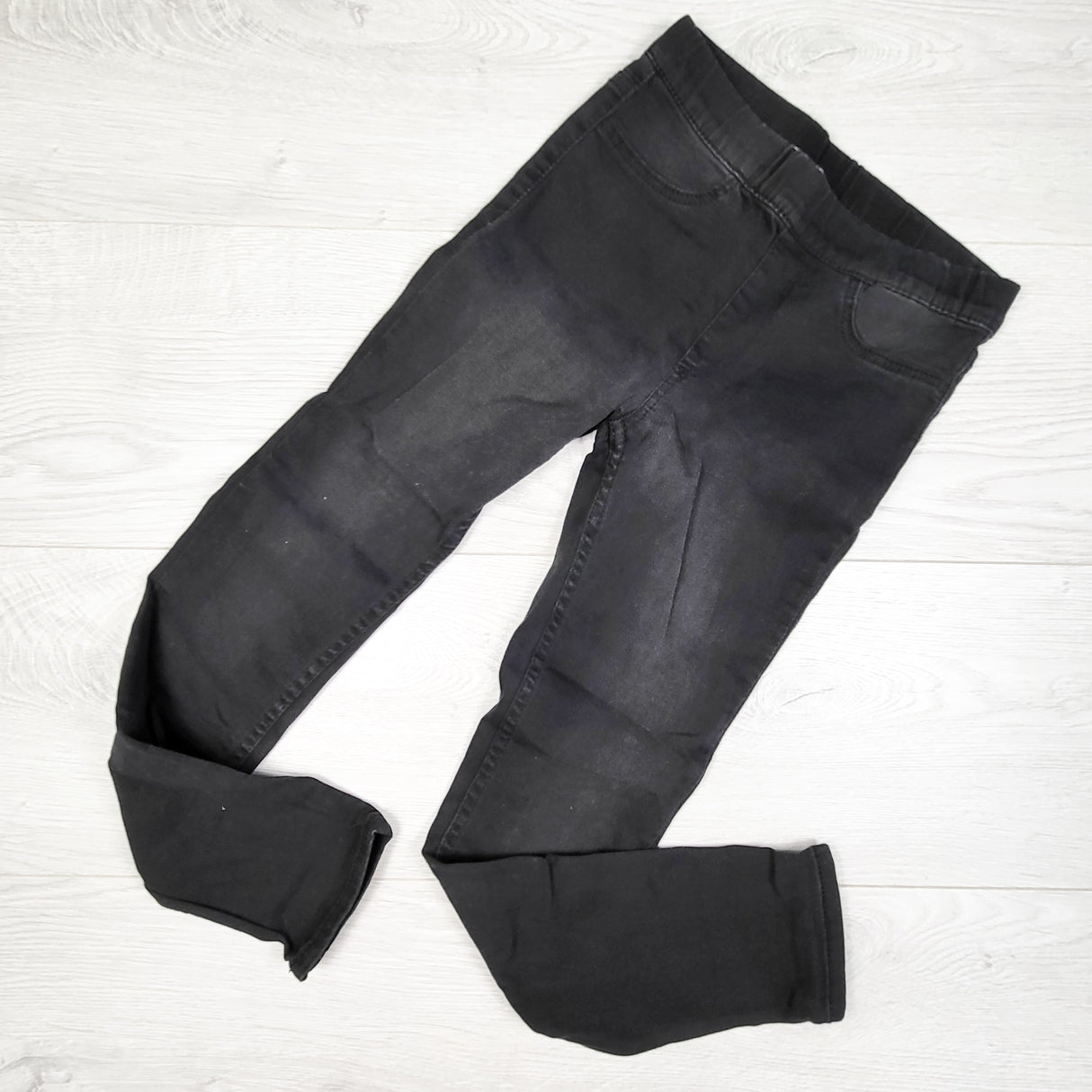 H and M black distressed jeggings. Size 6/7