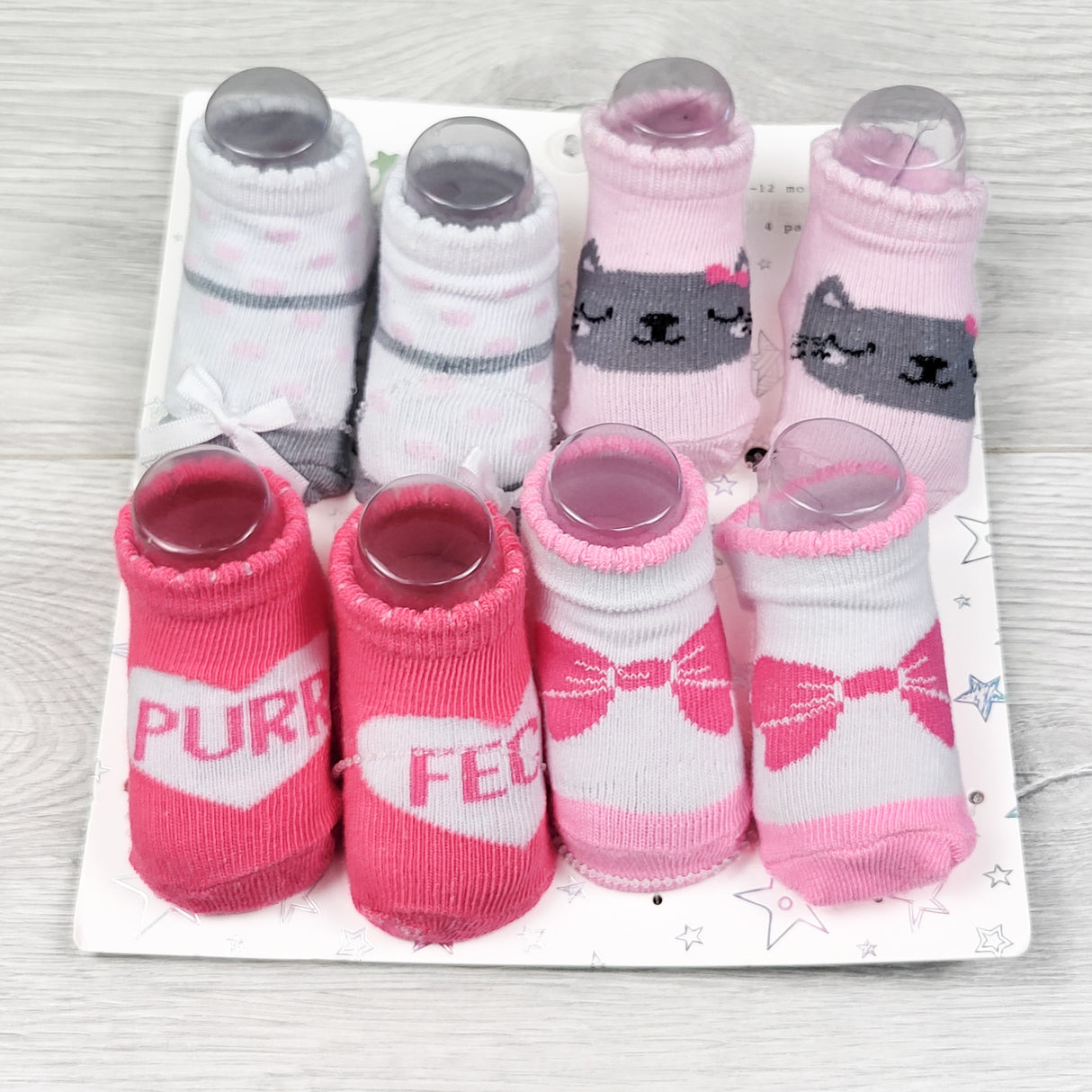 NEW - Rising Stars 4-pack socks. Size 0-12 months (no shipping)
