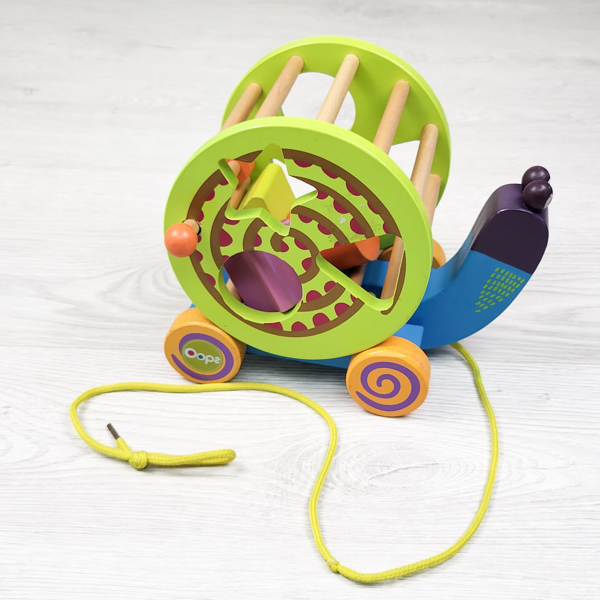 Oops wooden rolling snail shape sorter toy (sorry, no shipping)
