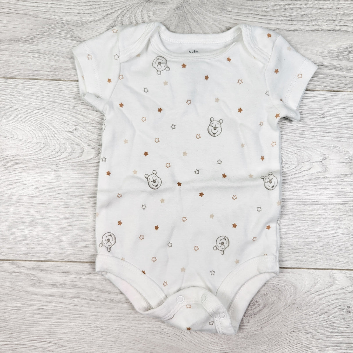 Disney white Winnie the Pooh bodysuit. Newborn size