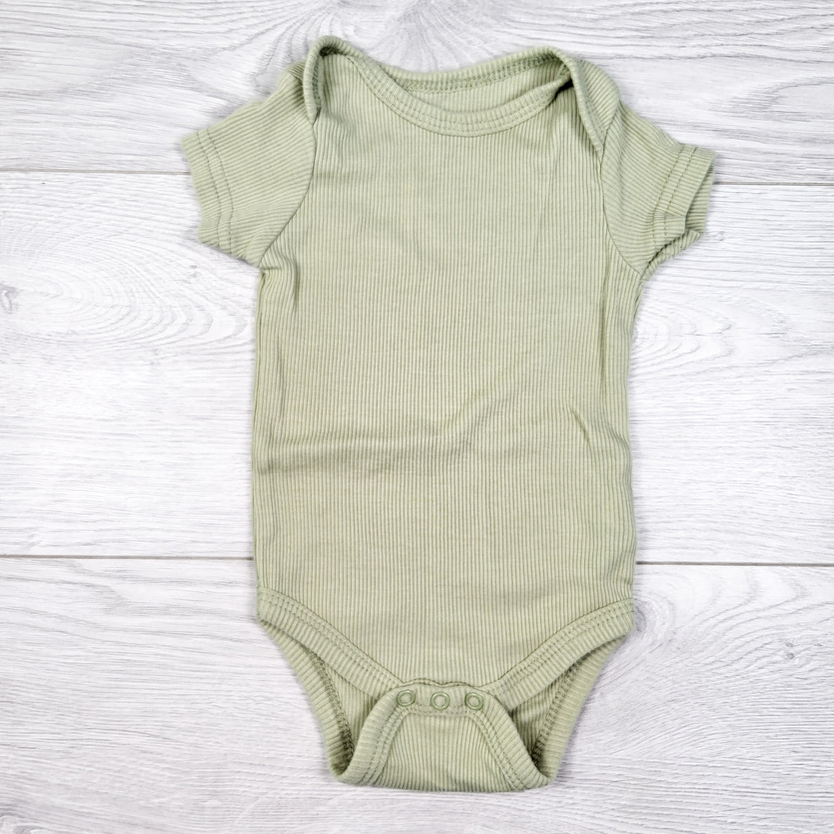 Chick Pea green ribbed short sleeve bodysuit. Size 3-6 months