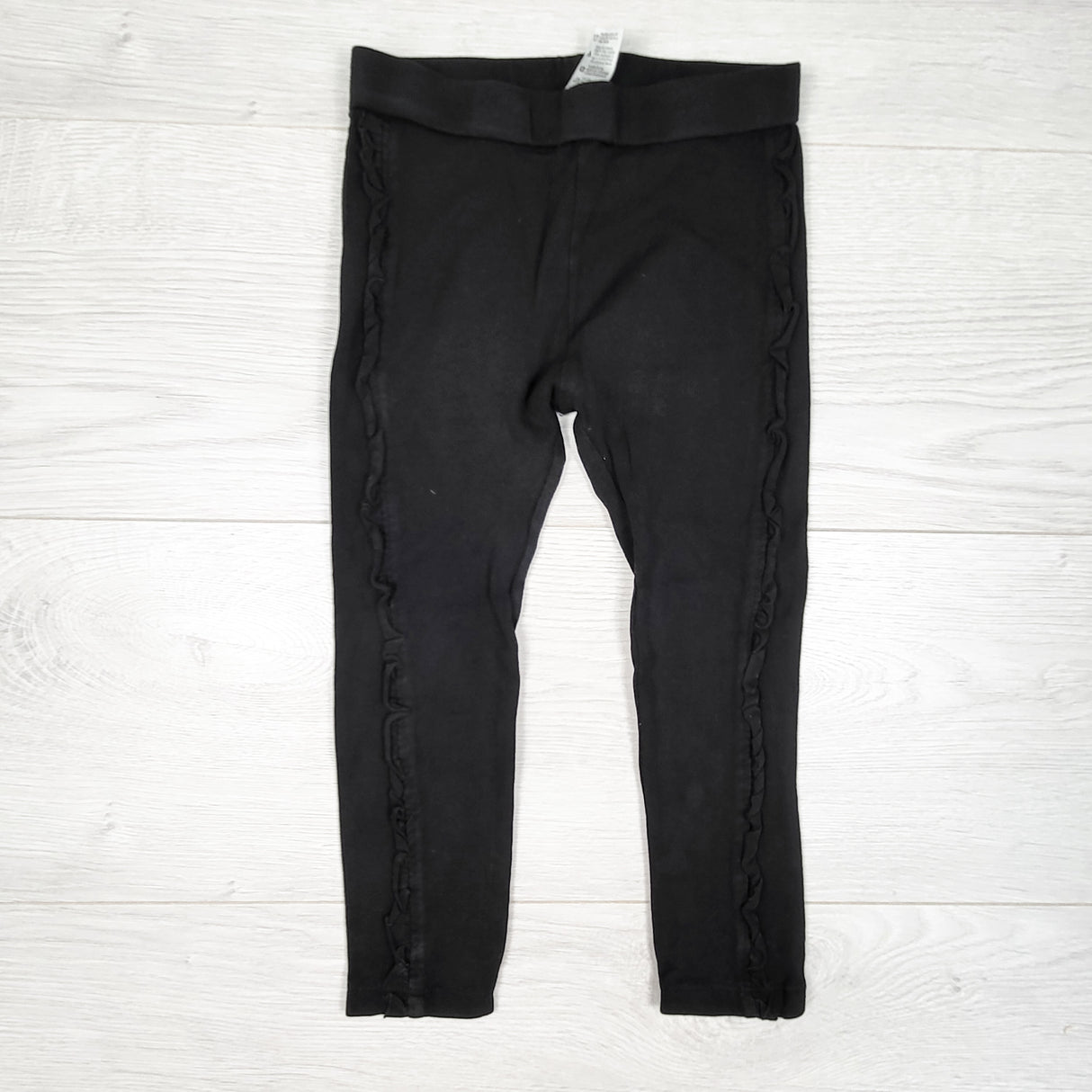 George black leggings with side stripe ruffles. Size 3T