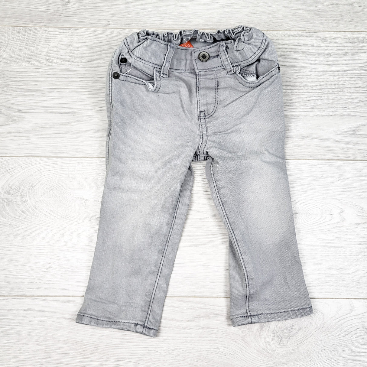 Children's Place grey skinny jeans. Size 9-12 months