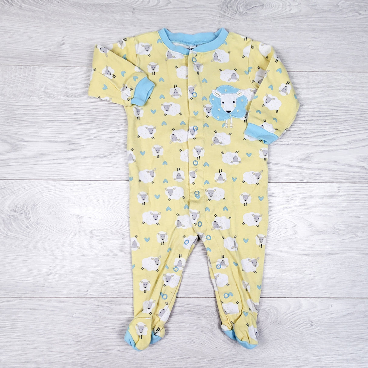 Pekkle yellow cotton sleeper with sheep. Size 6 months