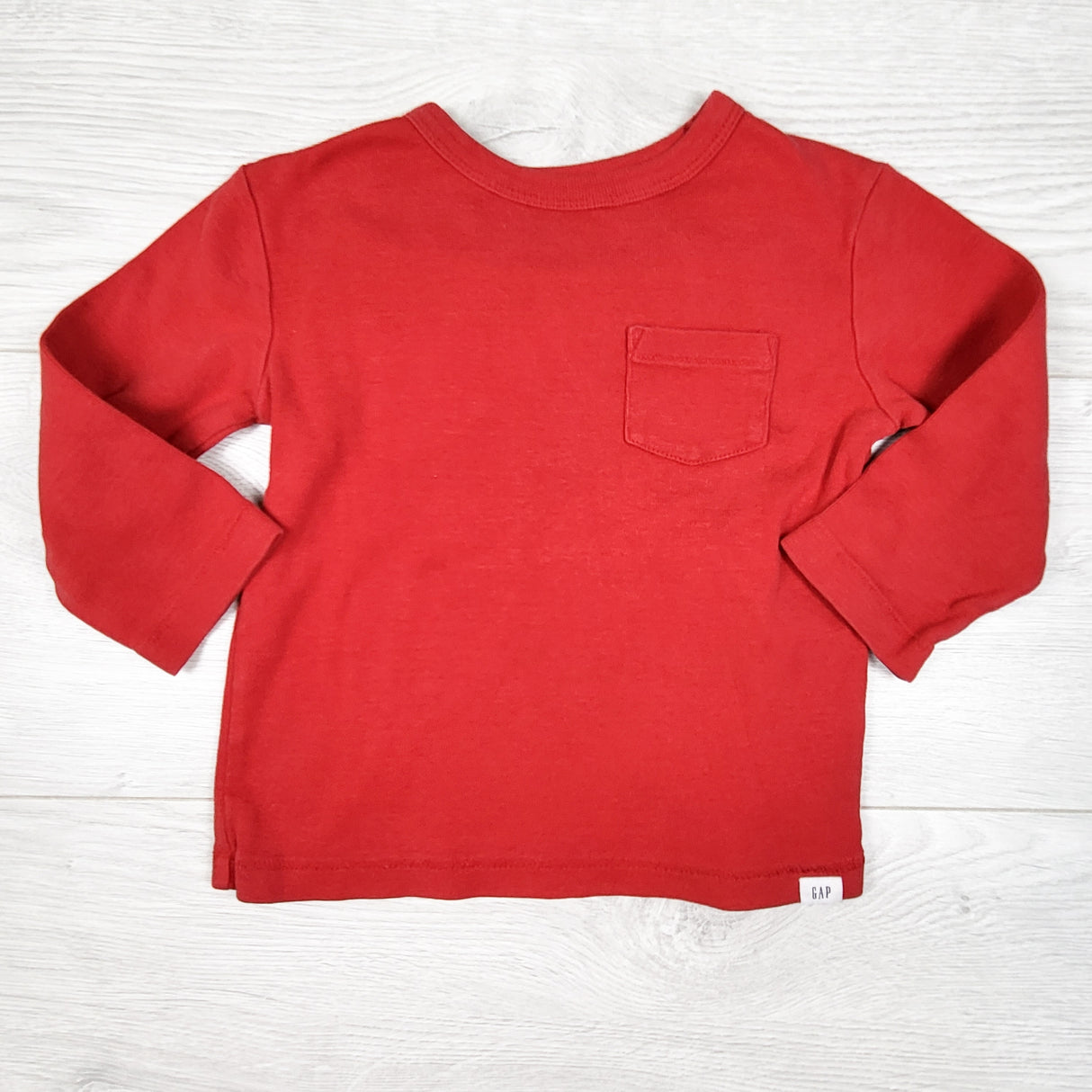 Gap red long sleeve pocket shirt. Size 12-18 months