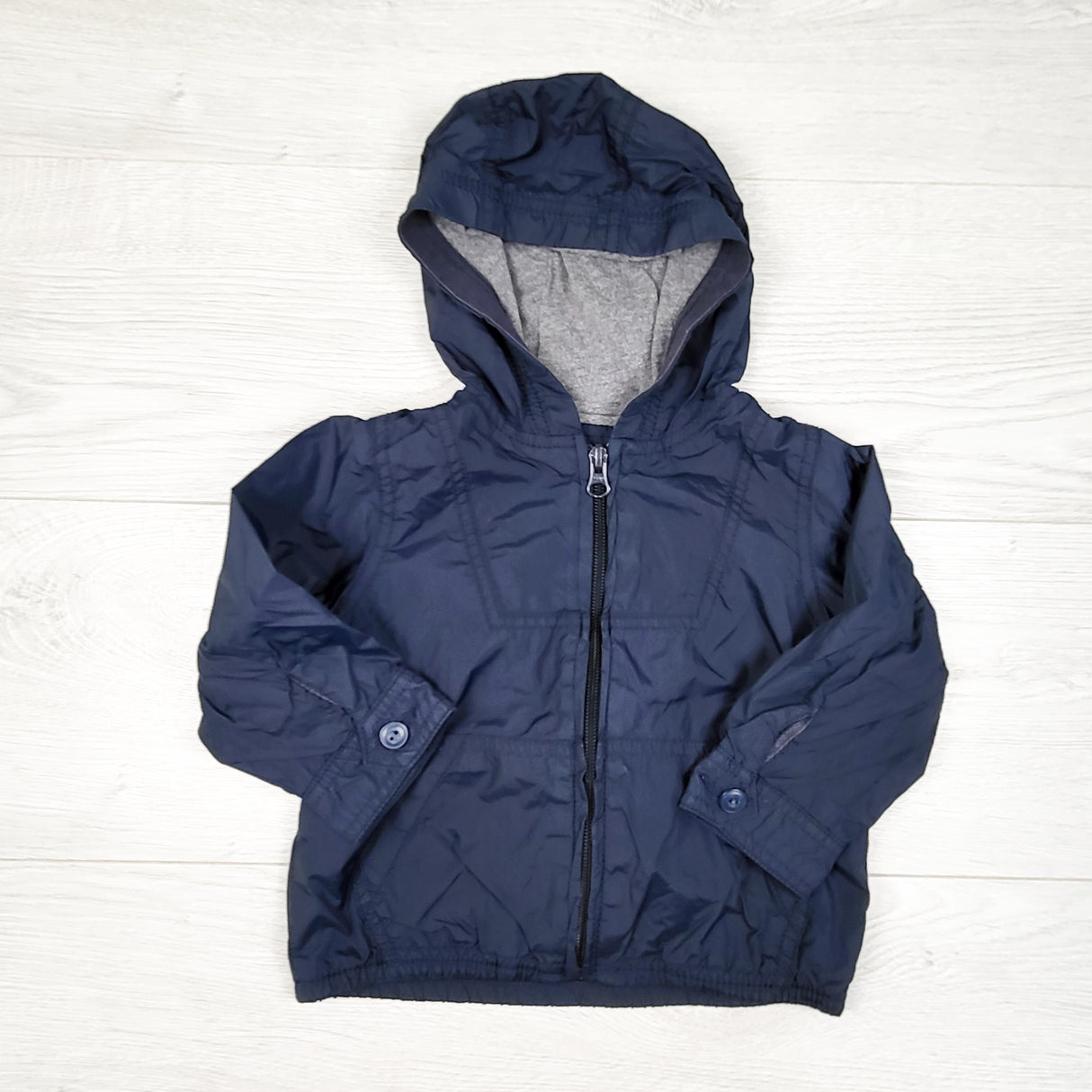 Gap navy jersey lined water resistant windbreaker. Size 12-18 months
