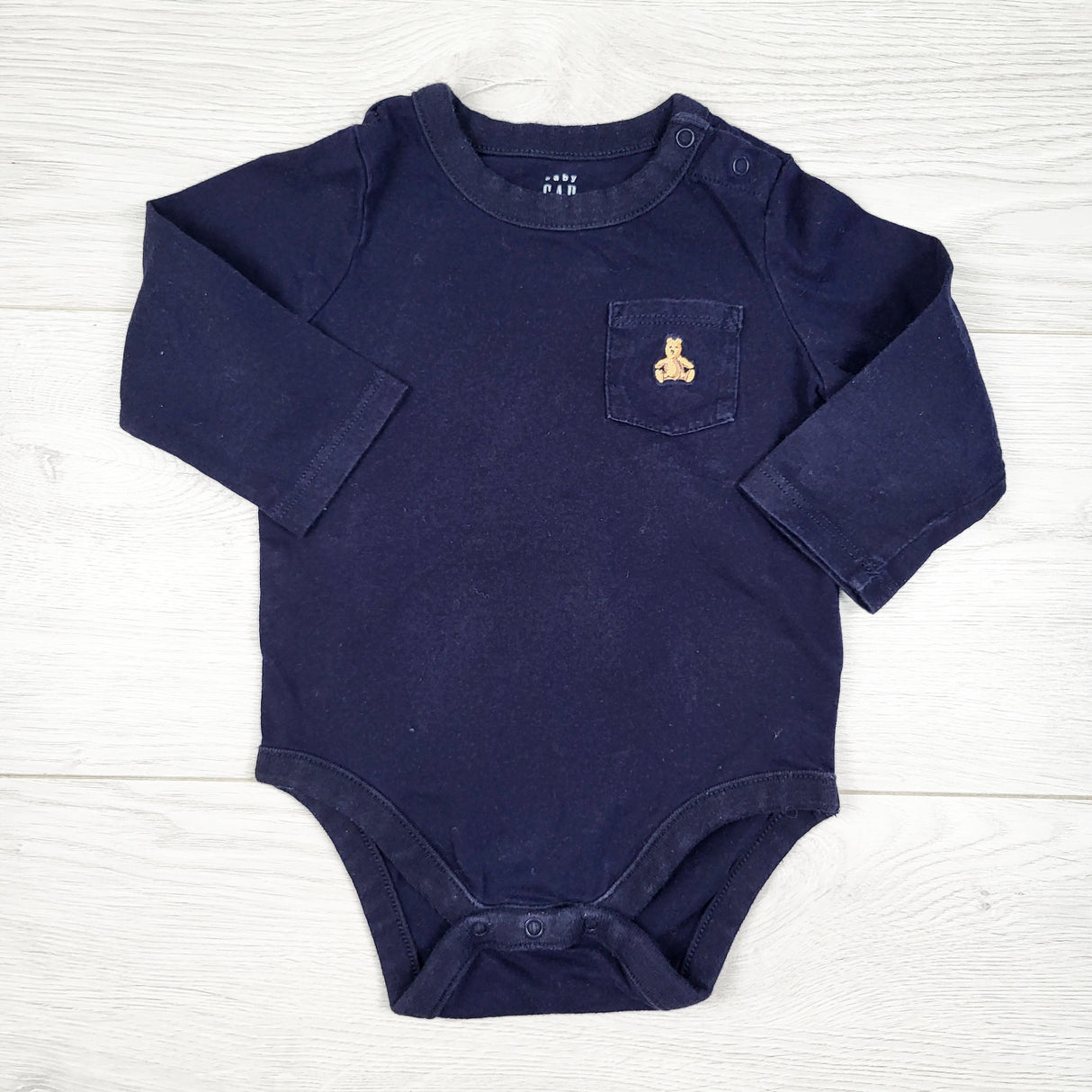Gap navy long sleeve bodysuit. Size 6-12 months