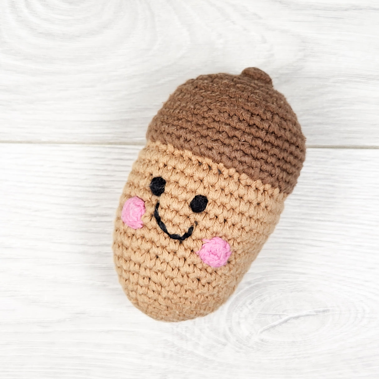 Pebble Child crochet acorn rattle