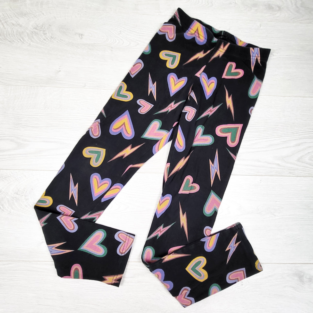 Old Navy black leggings with hearts. Size 10/12