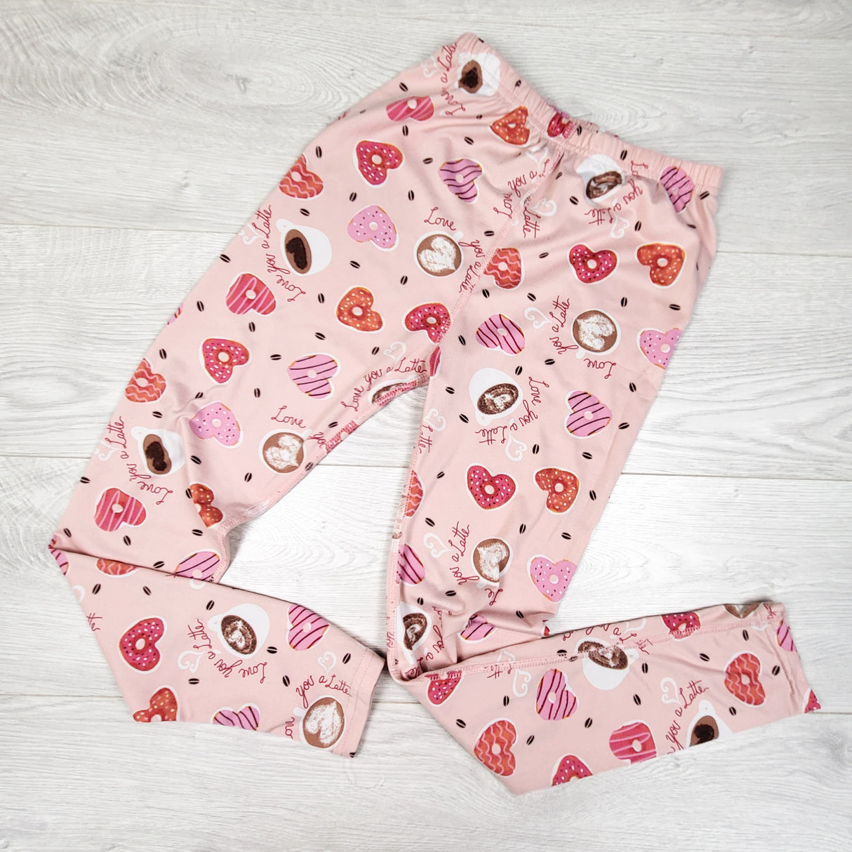 Pink leggings with heart shaped donuts. Size 10/12