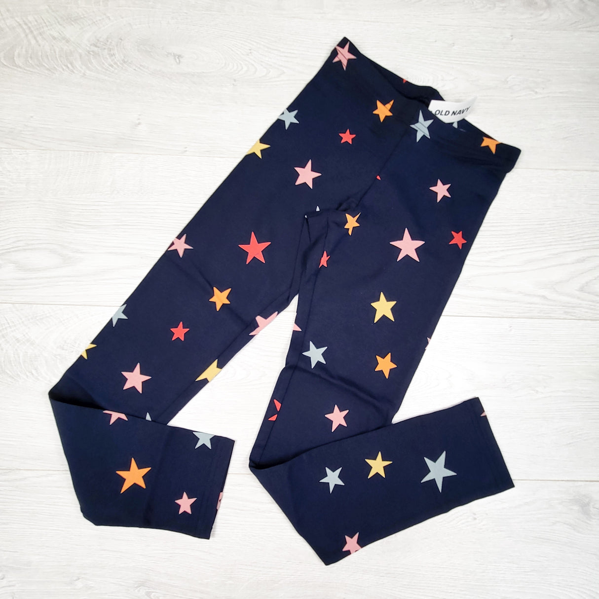 NEW - Old Navy navy leggings with stars. Size 10/12