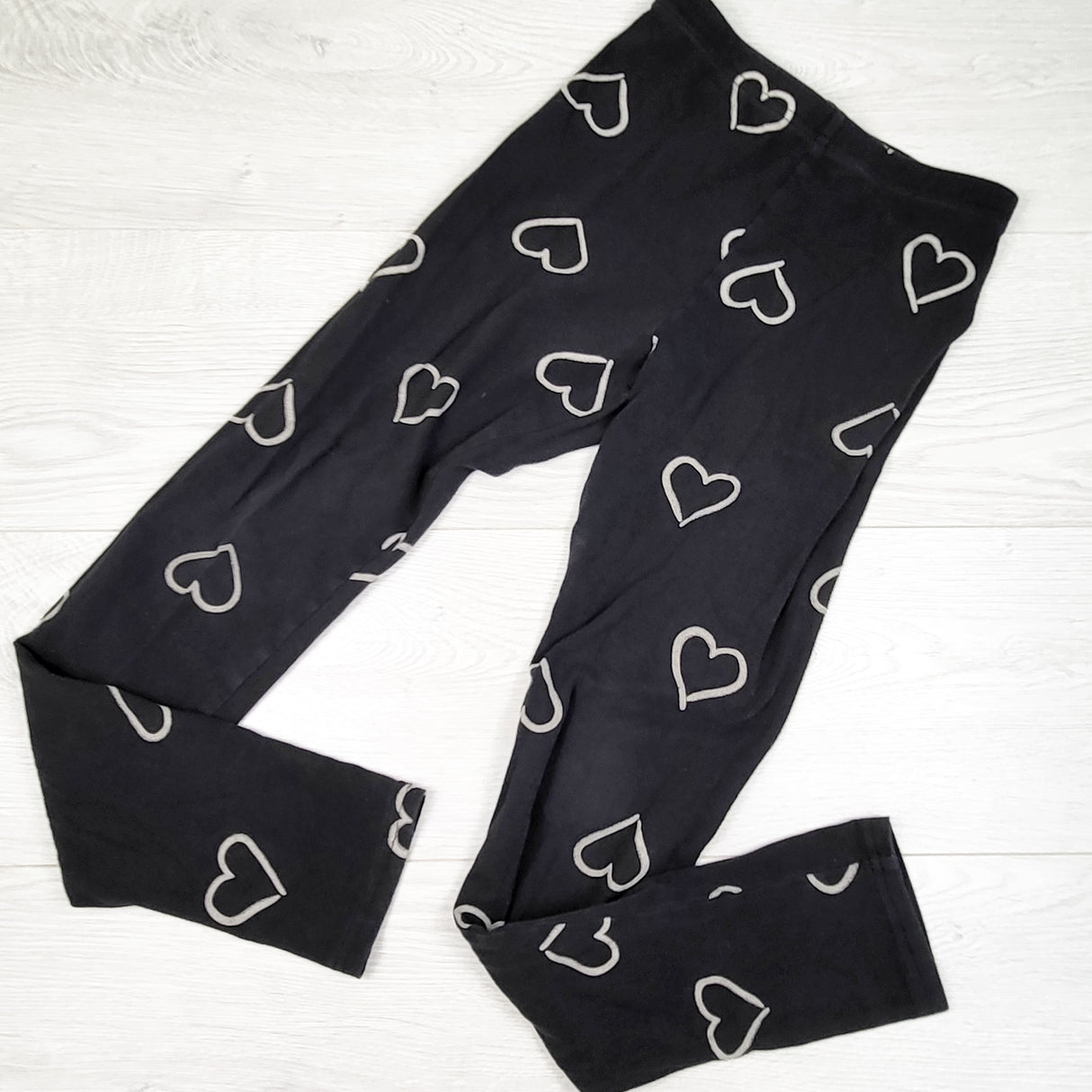 Old Navy black leggings with hearts. Size 10/12