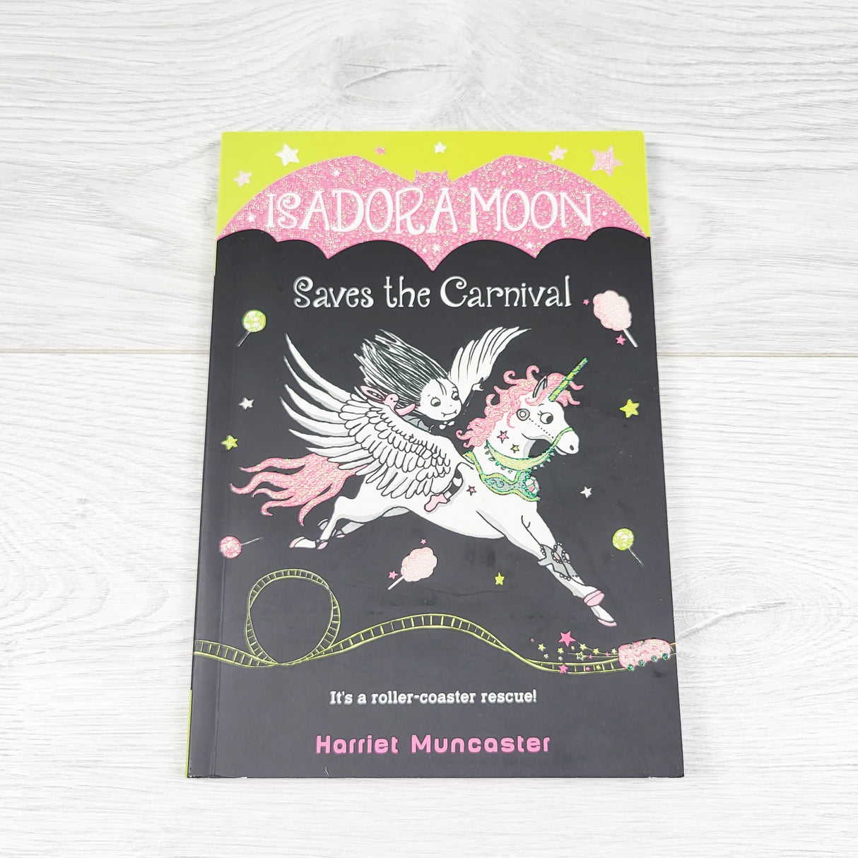Isadora Moon Saves the Carnival. Soft cover chapter book