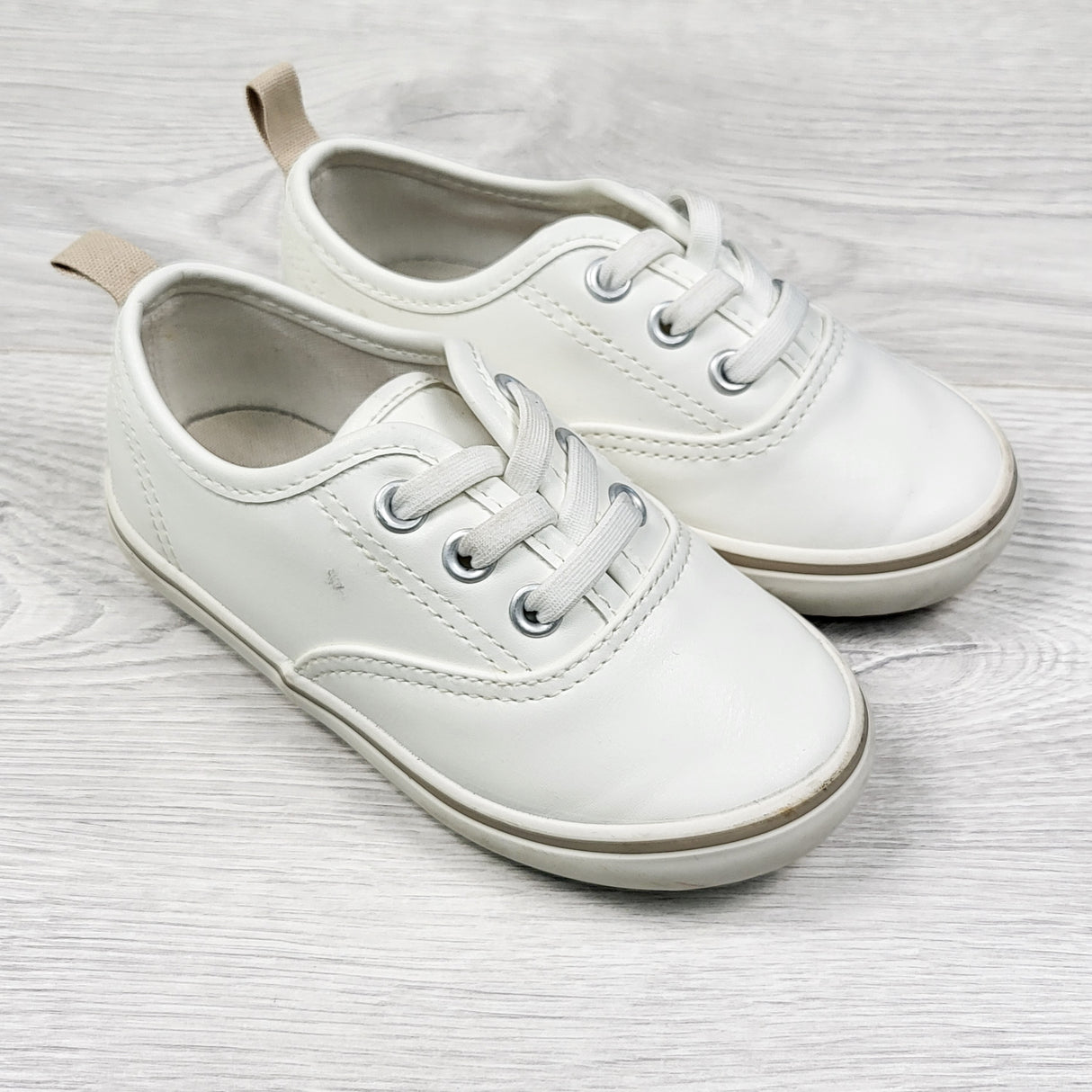 Old Navy white low rise slip-on sneakers. Size 7