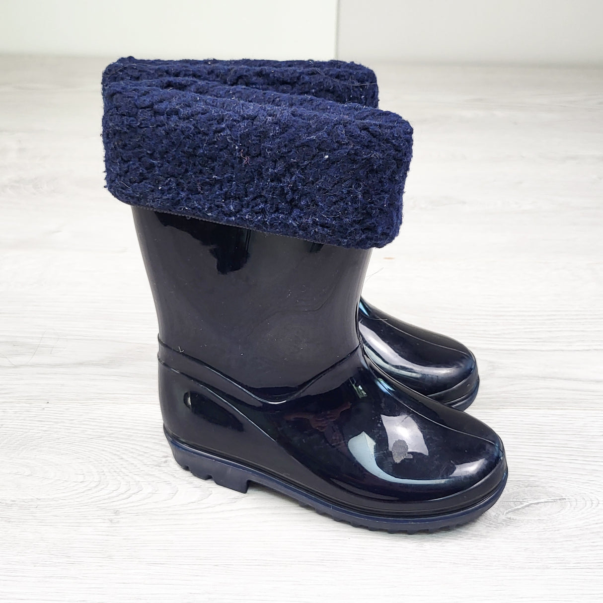 Carters navy rain boots with fleece lining. Size 8