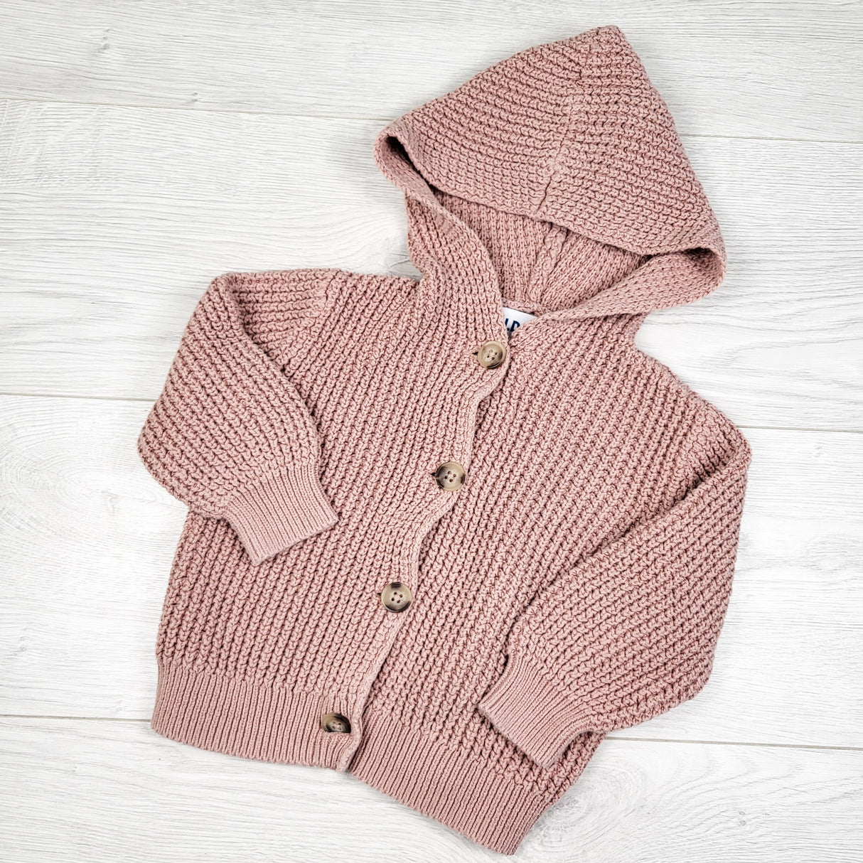Old Navy pink hooded waffle knit sweater. Size 18-24 months