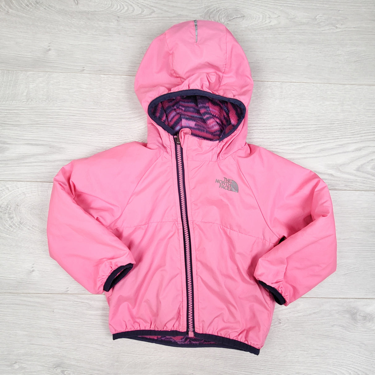 The North Face Infant Reversible Breezeway Wind Jacket. Sizes like 18 months