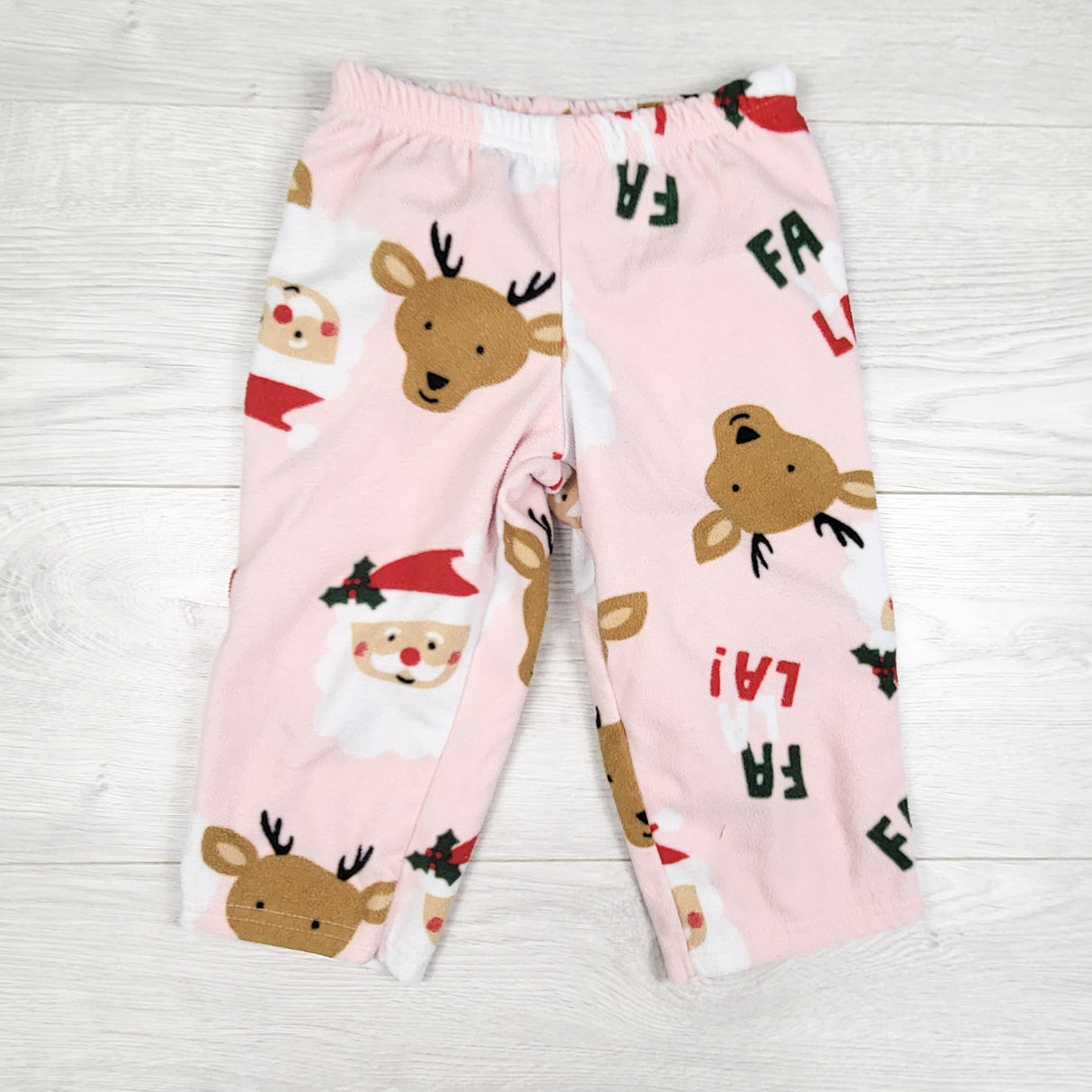 Carters pink fleece Christmas themed fleece sleep pants. Size 24 months