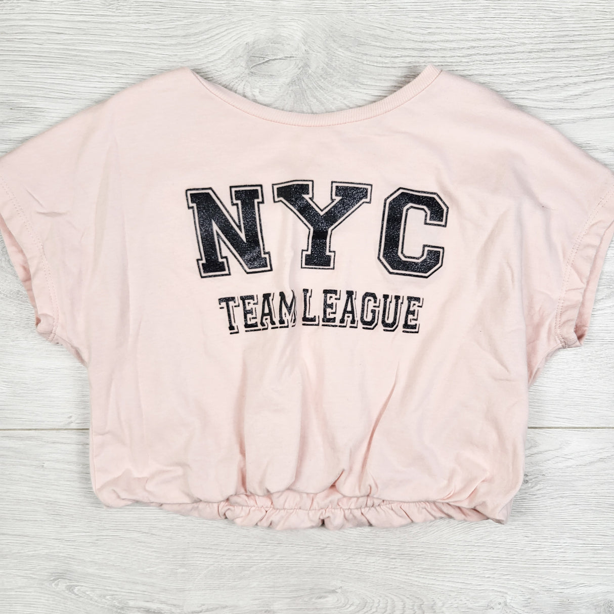 George pink double knit cropped "NYC" t-shirt. Size 10/12