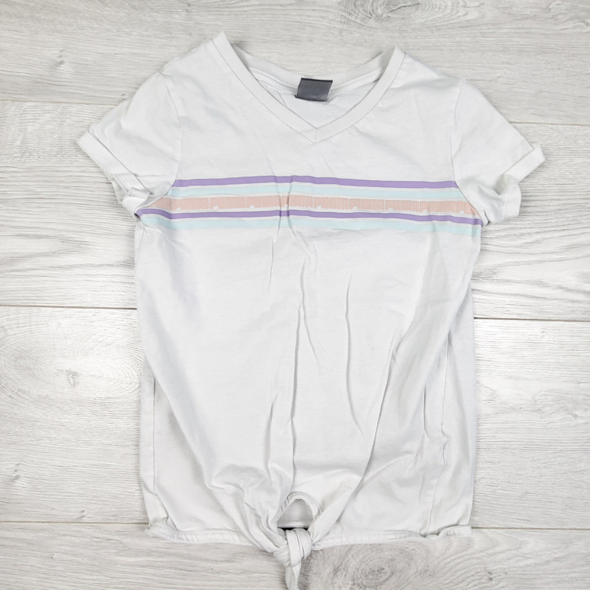 Puma white striped knotted t-shirt. Size 6