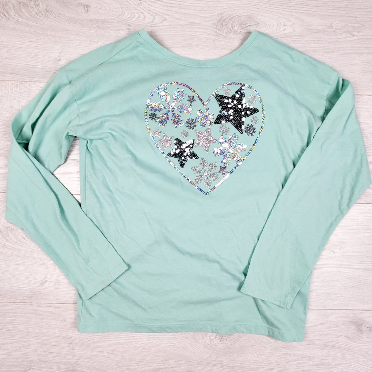 Children's Place mint top with sequin stars. Size 10/12