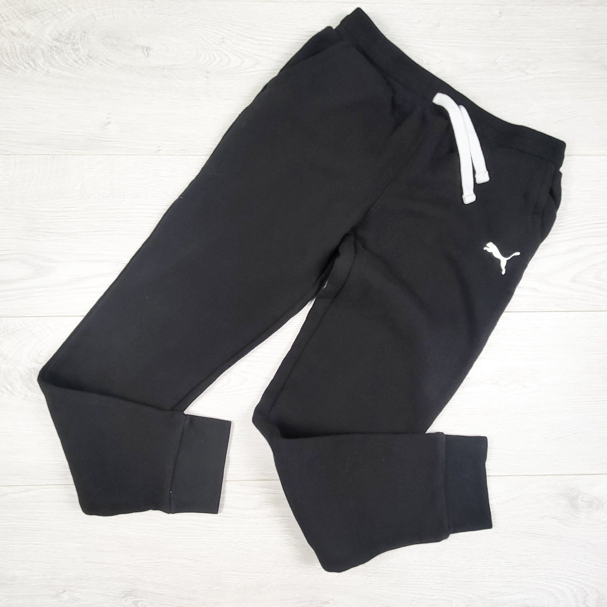 Puma black fleecy lined joggers. Size 10/12