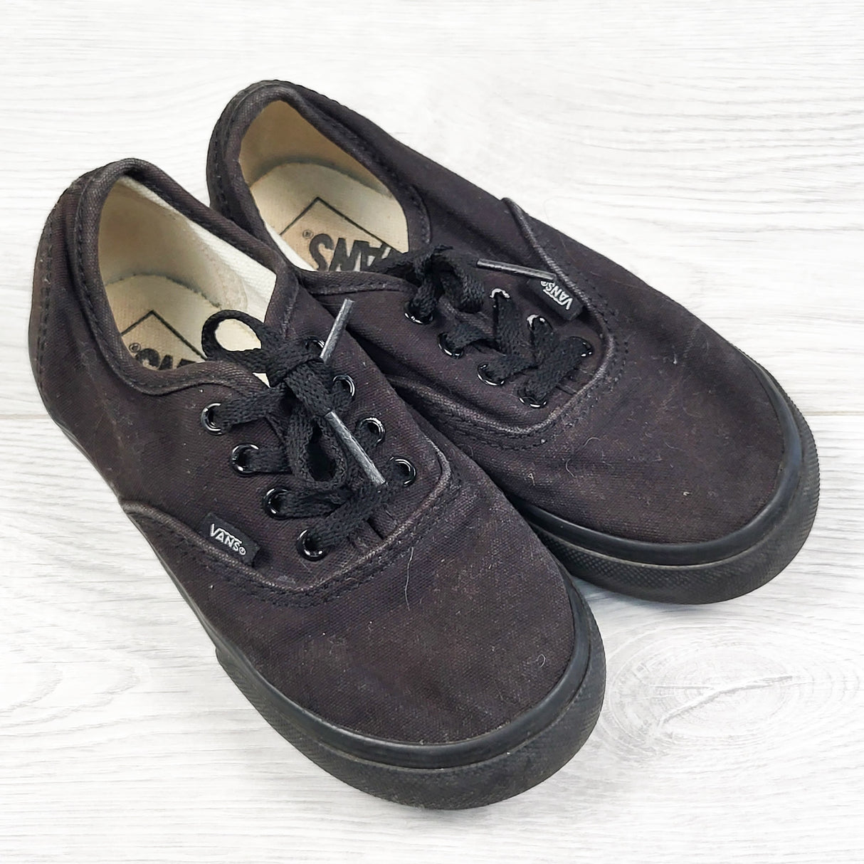 Vans black lace up canvas shoes. Size 10