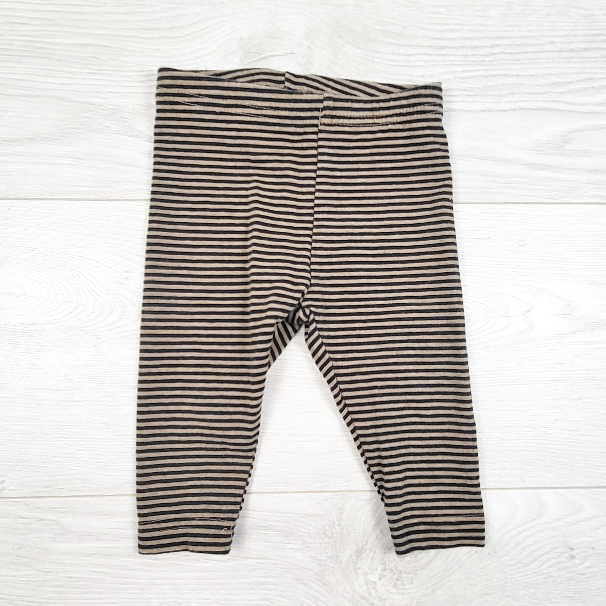 Carters tan and navy striped leggings. Size 6 months