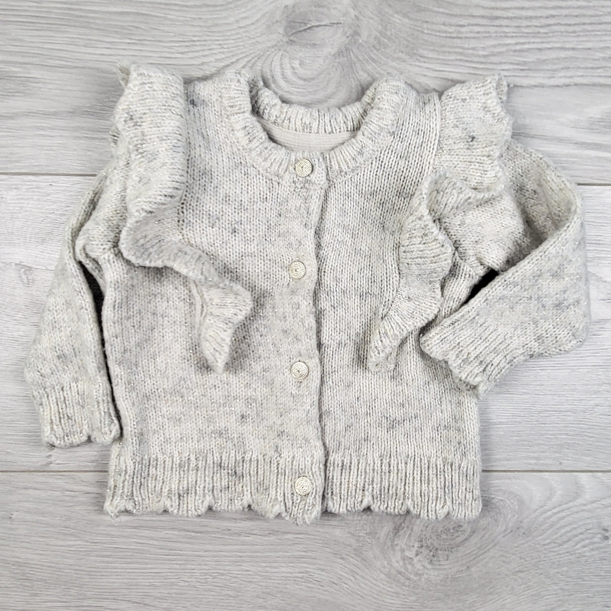 H and M grey ruffle cardigan sweater with sparkles. Size 4-6 months