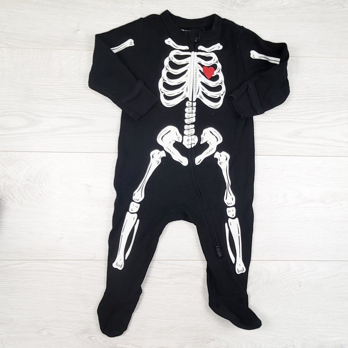 Old Navy black zippered skeleton sleeper. Size 3-6 months