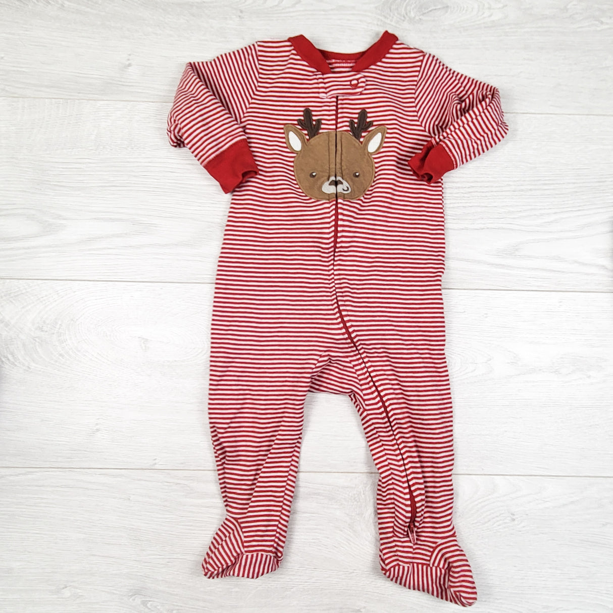 Carters red striped zippered sleeper with reindeer. Size 9 months