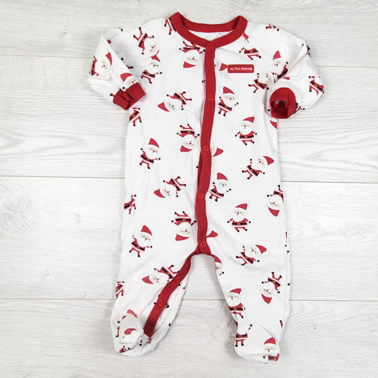 Just One You white sleeper with Santas. Size 9 months