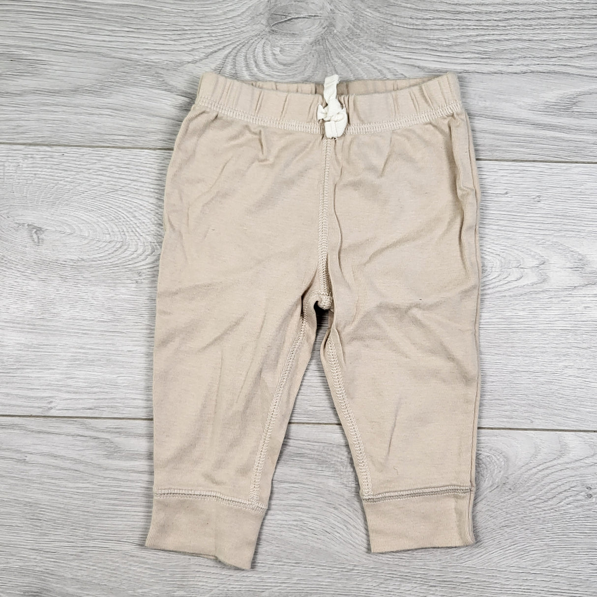 Carters beige cotton pants. Size 6 months